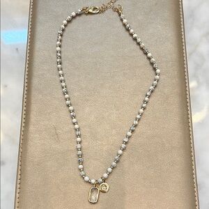 Elegant Gold and White Beaded Necklace